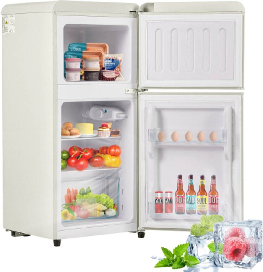 Learnlogic Retro koelkast. Freezer -combinatie. 88 8 cm hoog 45 5 cm breed twee dader met een totaal van 60 liter totaal volume 22 liter vriezervolume. 102 kWh jaar -27 ° C ∽ 13 ° C LED -licht. Crème wit energieniveau E